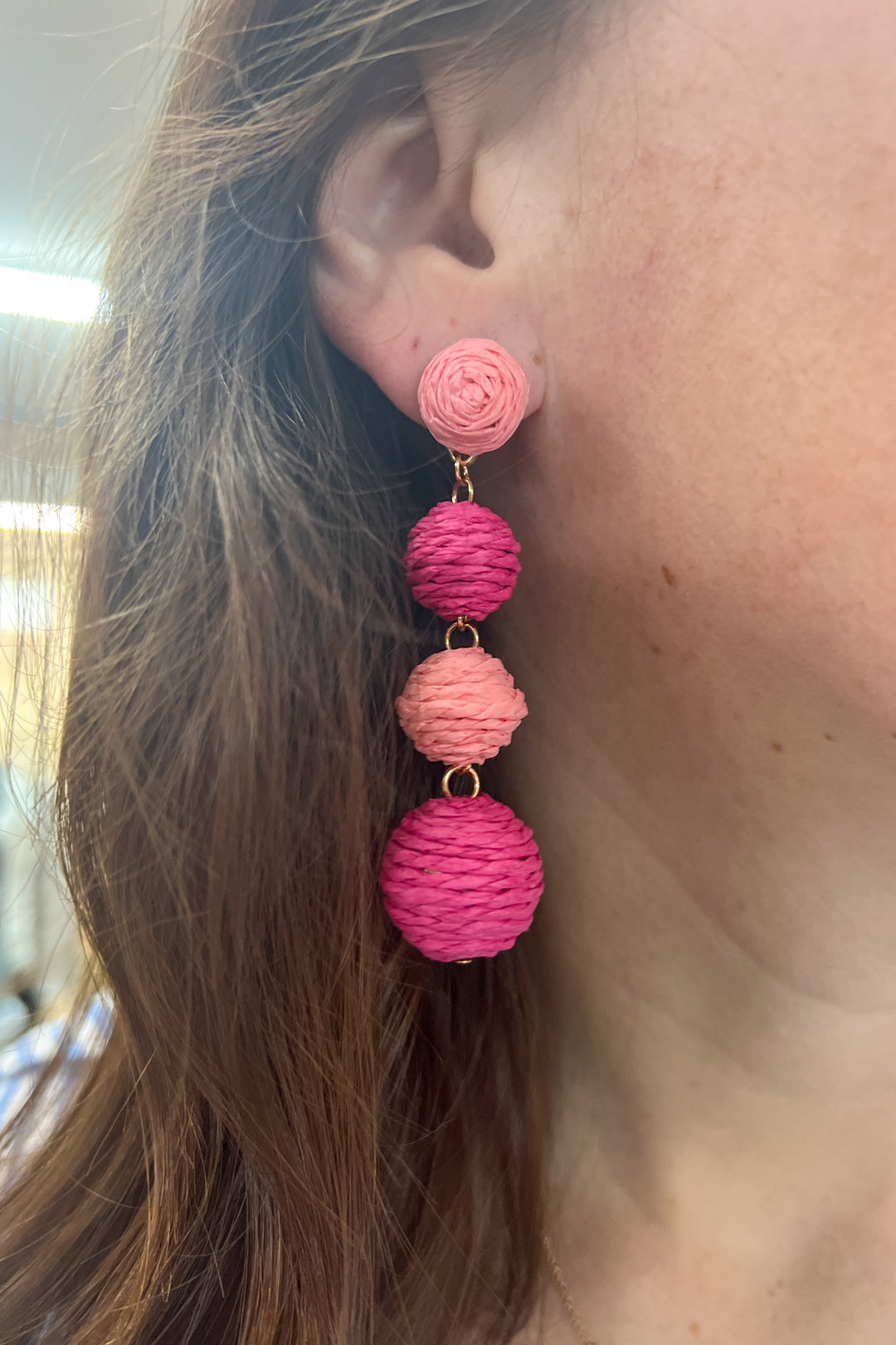 Raffia ball earrings, fuchsia