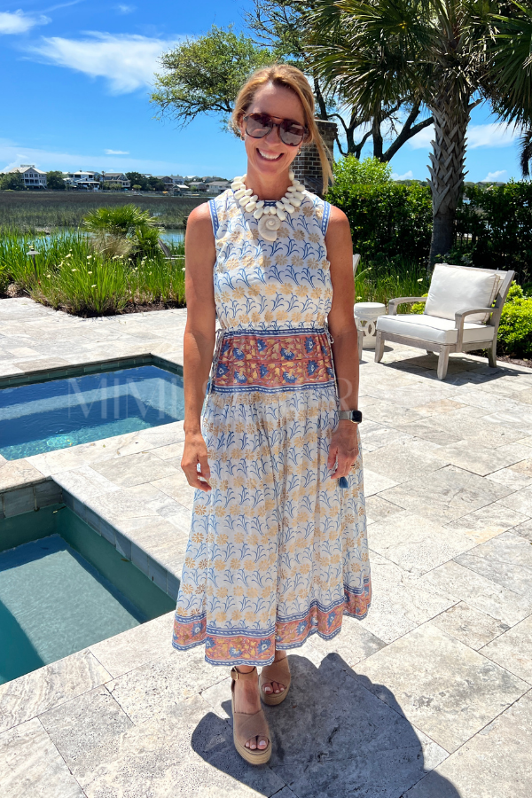 oliphant maxi dress Ruffle Collar Bell Hand block print pattern Smocked bodice Mock neck with pleated ruffle details along neckline and shoulder Tiered skirt maxi length Material Oliphant Cinched Shirt Maxi Dress